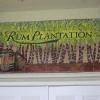 Hand-made Ceramic Tortuga Tile featuring an Estate Sign that reads Rum Plantation with glazed images of sugar cane and rum barrels. 30" x 5'.